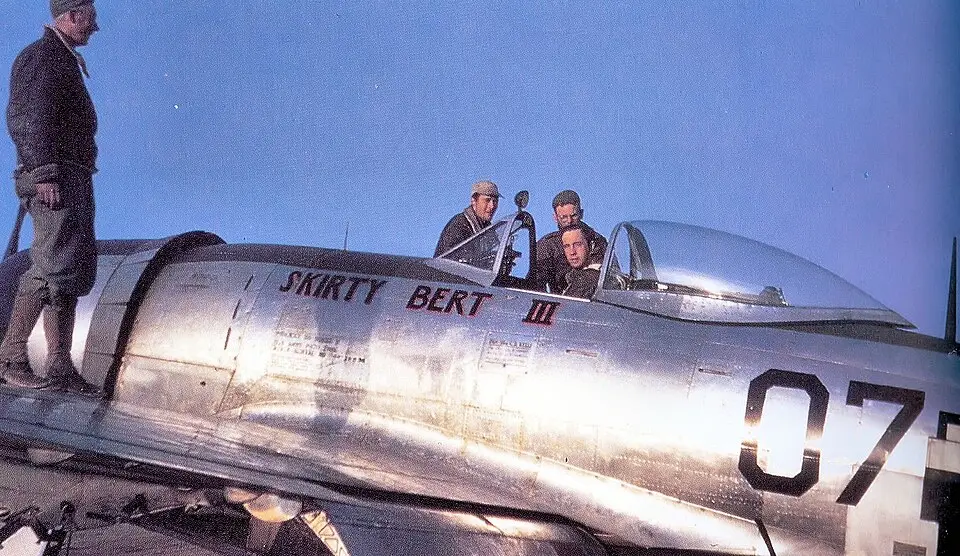 A P-47 Thunderbolt fighter plane in flight, 1945
